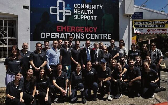 NSW Premier Chris Minns (centre, back row) visiting volunteers at the CHS Emergency Operations Centre.