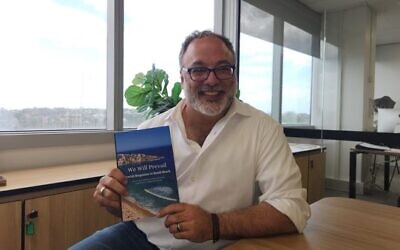 Rabbi Menachem Creditor with a copy of "We Will Prevail". Rabbi Menachem Creditor with a copy of "We Will Prevail".