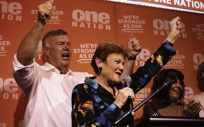 One Nation Member for Farrer David Farley (left), and One Nation Leader Pauline Hanson celebrate after winning the Farrer by-election.
Photo: AAP Image/Bianca De Marchi.
