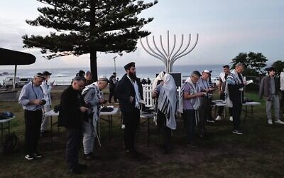 Dawn prayers at Bondi Beach on Tuesday. Photo: Gareth Narunsky