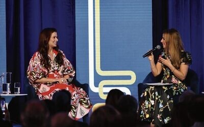 Debra Messing (left) and Sharri Markson on stage at the JCA Annual Campaign event. Photo: Daniel Katz