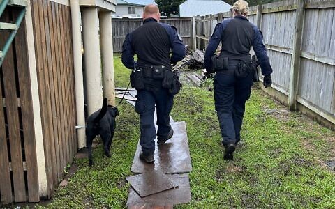 Australian Federal Police executing the search warrant. Photo: AFP.