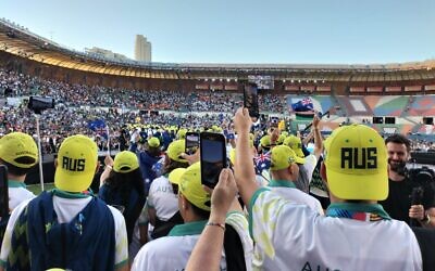 Australian team members entering Teddy Stadium in Jerusalem in the 2022 Maccabiah Games opening ceremony. Photo: Shane Desiatnik