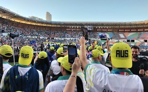 Australian team members entering Teddy Stadium in Jerusalem in the 2022 Maccabiah Games opening ceremony. Photo: Shane Desiatnik