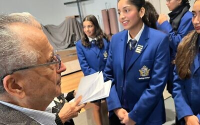 Holocaust survivor Peter Gasper, speaking to Heritage College students after the memorial. Photo: Bruce Hill.