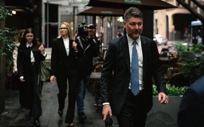 ABC editorial director Gavin Fang (front) and ombudsman Fiona Cameron (second from left) arrive to give evidence at the Royal Commission last Thursday. Photo: AAP Image/George Chan