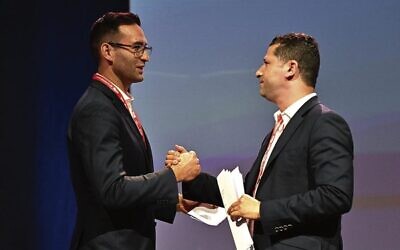 Josh Burns and Bassem Abdo during the ALP national conference. Photo: AAP Image/Mick Tsikas