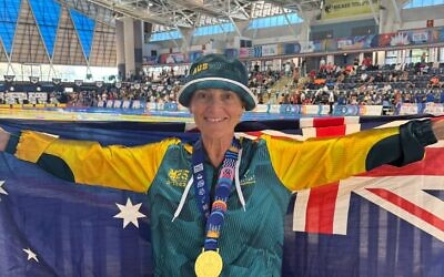 Masters swimmer Alida Lipton wearing her gold medal at the Maccabiah Games earlier this week at the Wingate Institute's Pool near Netanya.