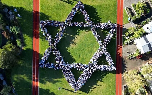 Bialik College students create a Magen David for Yom Ha'atzmaut. The drone footage was captured by Bialik student Jack Jolson. Photo: Bialik College Bialik College students create a Magen David for Yom Ha'atzmaut. The drone footage was captured by Bialik student Jack Jolson. Photo: Bialik College