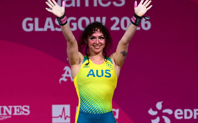 Ashley Kolomoisky sporting a beaming smile in her Commonwealth Games debut on July 27 in Glasgow (early morning July 28 AEST). Photo: AAP Image/Dean Lewins via AP