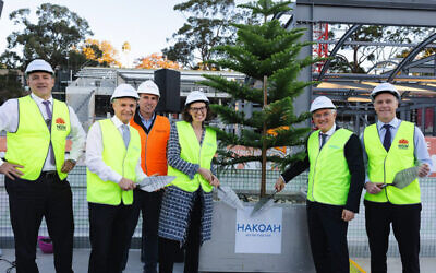 From left: Steve Kamper MP, Matt Thistlethwaite, Jamie Crookes (builder), Allegra Spender MP, Steven Lowy, Chris Minns MP. Photo: Giselle Haber