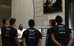 Rabbi Eli Schlanger z"l delivering a pilot of Project Noah to the Sydney Roosters. Photo: Supplied