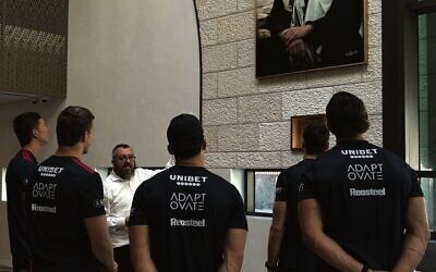 Rabbi Eli Schlanger z"l delivering a pilot of Project Noah to the Sydney Roosters. Photo: Supplied
