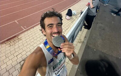 Aussie Joel Solomon after winning silver in the open men's 5km run on July 6 at the Maccabiah Games, at Hebrew University's athletics stadium.