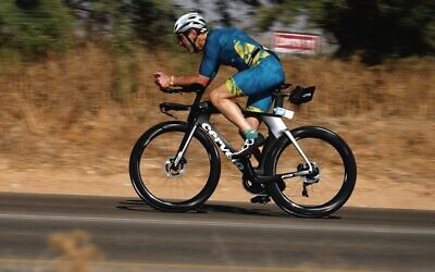 Barry Lipp, Maccabi Australia's vice-president, on his way to winning the 65+ men's cycling individual time trial at the 2026 Maccabiah Games on July 9 at Eshkol National Park, Israel. 
Photo: MWU/Maccabiah