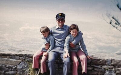 Michel Cojot with his sons Olivier and Stephane. 
Photos: From 'To Kill A Nazi,' courtesy of the Cojot family