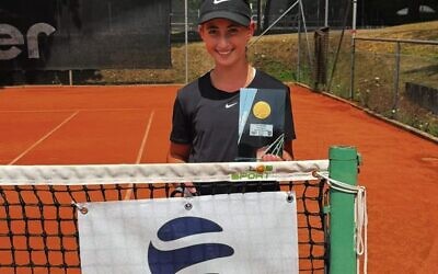 Darcy Basist holding her singles trophy in Waiblingen, Germany.