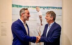 Alex Ryvchin and Greg Shand with Michael Zavros' artwork. Photo: supplied