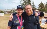 JCA CEO Alain Hasson (left) and Mitzvah House founder Rabbi Noach Koncepolski at Archer Park on Sunday. Photo: Daniel Katz