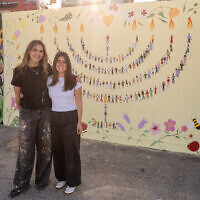 Mia Lazarus and Jenna Caspary with their finished mural. Photo: supplied