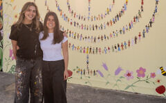 Mia Lazarus and Jenna Caspary with their finished mural. Photo: supplied