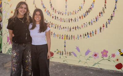 Mia Lazarus and Jenna Caspary with their finished mural. Photo: supplied