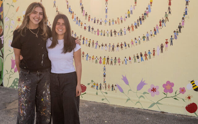 Mia Lazarus and Jenna Caspary with their finished mural. Photo: supplied