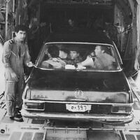 Commandos from Sayeret Matkal with a Mercedes they used to deceive the Ugandans. 
Photo: IDF Spokesman