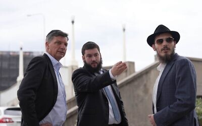 From left: Angus Taylor, Rabbi Yanky Super, Rabbi Mendy Berger.