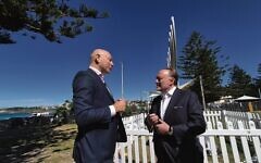 Lord Roberts of Belgravia (right) with Arsen Ostrovsky at Bondi. 
Photo: Gareth Narunsky