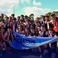 The AJAX Falcons celebrate winning the SMJFL 17-18 boys division 3 grand final. Photos: SMJFL