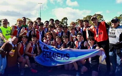 The AJAX Falcons celebrate winning the SMJFL 17-18 boys division 3 grand final. Photos: SMJFL