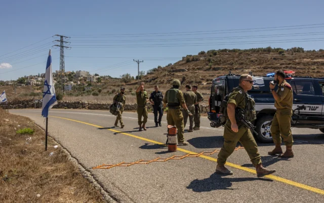 Israeli soldiers and police officers near the scene of a shooting attack at a spring near the Israeli settlement of Neve Tzuf in the West Bank, September 20, 2026. Photo: Hilel Ben Or/Flash90