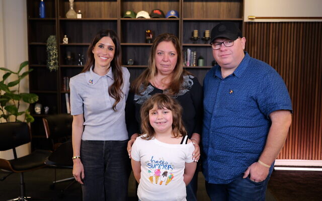 Sarah with Valentyna, Michael and Summer. Photo: supplied