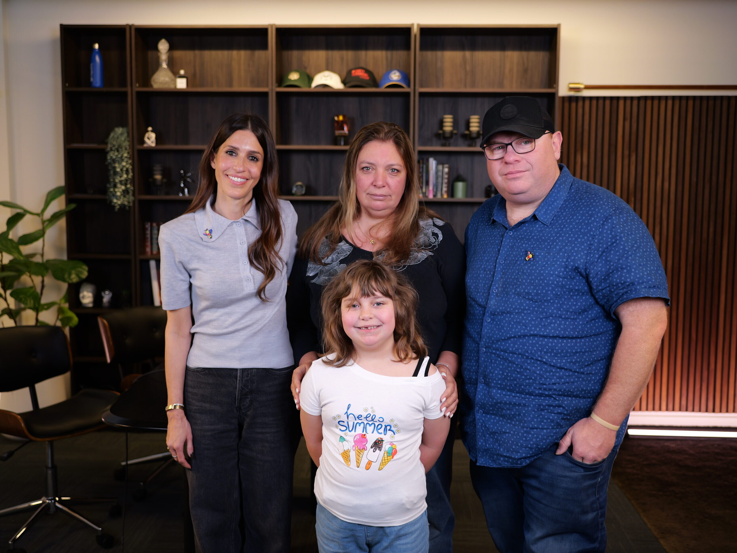 Sarah with Valentyna, Michael and Summer. Photo: supplied Sarah with Valentyna, Michael and Summer. Photo: supplied