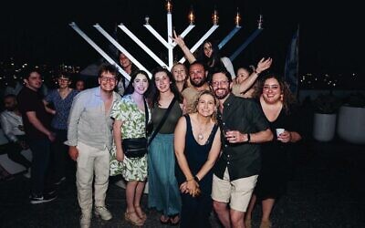 Open Court's 2025 rooftop Chanukah party in partnership with numerous other Jewish youth organisations.   Photo: Ofri Barnea