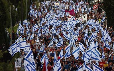 Demonstrators march to protest the government's judicial overhaul plans in July, 2023. Photo: Ronaldo Schemidt/AFP