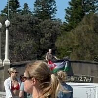 The alleged flag hanging from the pedestrian bridge. Photo: AJA