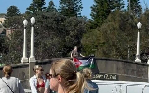The alleged flag hanging from the pedestrian bridge. Photo: AJA