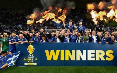 South Melbourne celebrate winning the 2026 Australia Cup final against Melbourne Victory at AAMI Park on October 10. 
Photo: AAP Image/Scott Barbour