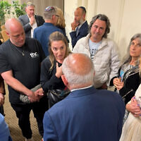 Chris Sidoti speaking to members of the audience afterwards. Photo: Bruce Hill