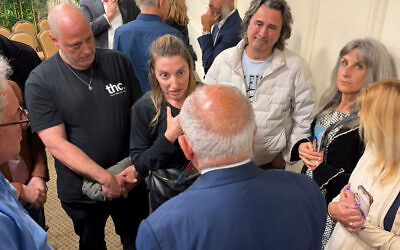 Chris Sidoti speaking to members of the audience afterwards. Photo: Bruce Hill