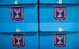Workers prepare ballot boxes for the upcoming election at the Central Elections Committee warehouse in Shoham, ahead of their distribution to polling stations across the country, October 14, 2026. (Yonatan Sindel/Flash90)