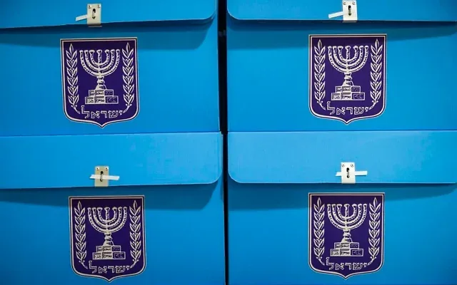 Workers prepare ballot boxes for the upcoming election at the Central Elections Committee warehouse in Shoham, ahead of their distribution to polling stations across the country, October 14, 2026. (Yonatan Sindel/Flash90)