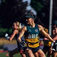Ashleigh Werner wearing the green and gold for Australia in flag football. Photo: Flag Football Australia