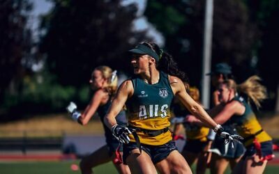 Ashleigh Werner wearing the green and gold for Australia in flag football. Photo: Flag Football Australia