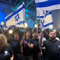 Activists celebrate at the Yashar party headquarters in Tel Aviv as early exit polls show the opposition bloc winning more seats. Photo: Matan Siegel/Times of Israel