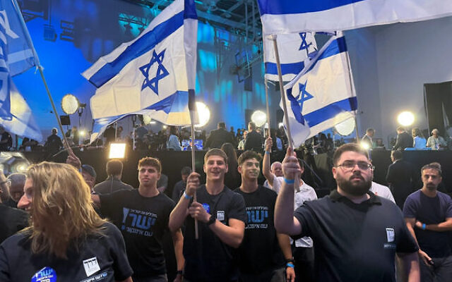 Activists celebrate at the Yashar party headquarters in Tel Aviv as early exit polls show the opposition bloc winning more seats. Photo: Matan Siegel/Times of Israel