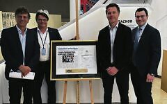 From left: Kevin Sumption (2nd from left) with Greg Shand and NSW Premier Chris Minns. *Hi-res pic was in 9/12/22 Syd p6, Cut Bark out