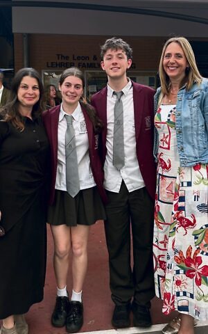 Emanuel school alumni watch children graduate